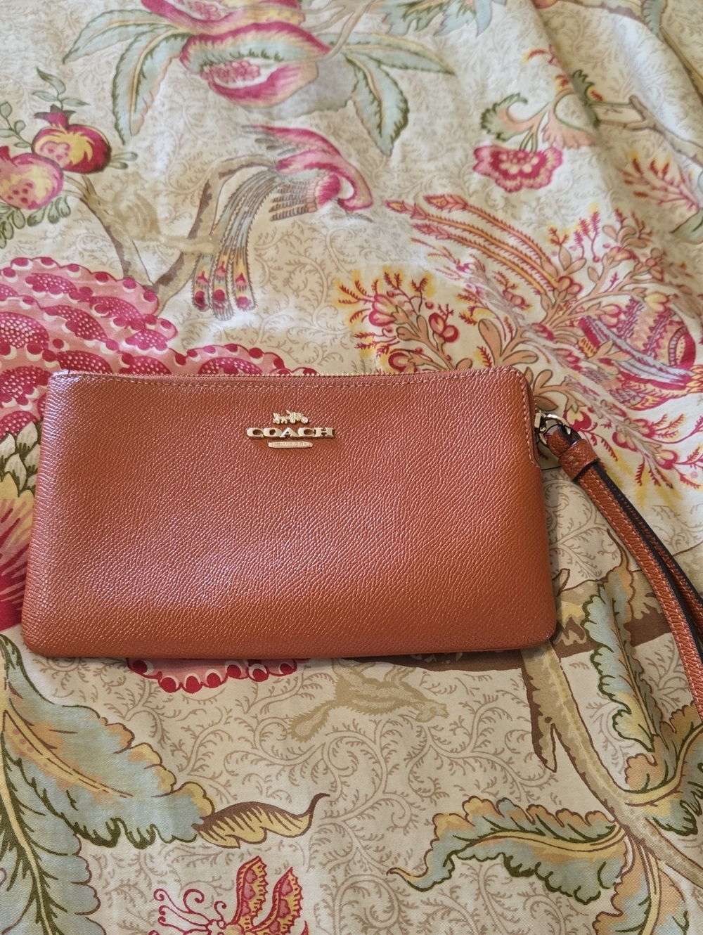 COACH Pebbled Leather Wristlet in Burnt Orange